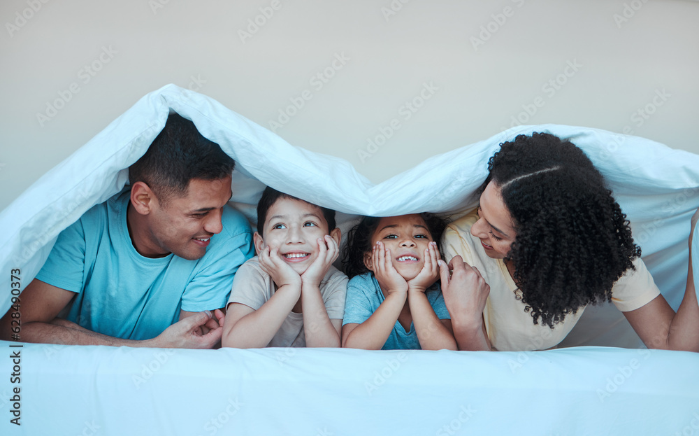 Blanket, family and parents with children in bed for bonding, quality time and affection in morning.