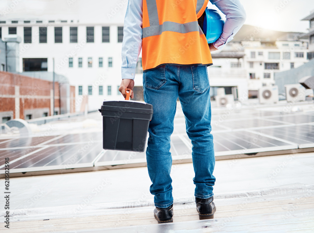 Tool box, construction worker and back with solar panel maintenance and labor outdoor. Roof, eco eng