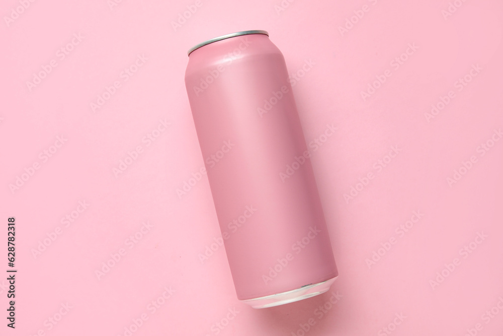 Can of soda on pink background