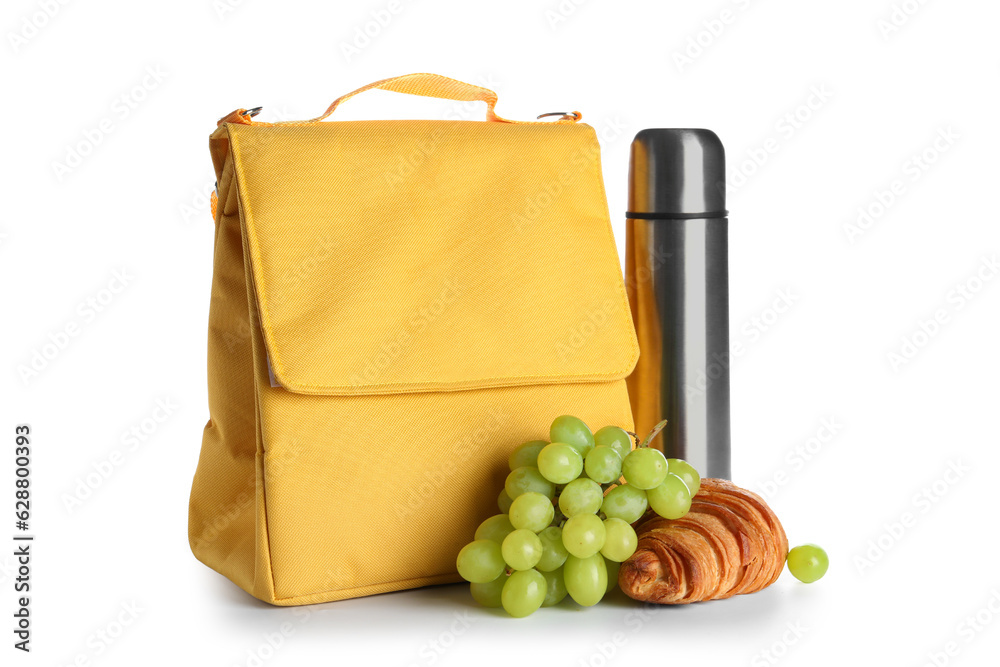 Lunch box bag with thermos, grapes and croissant isolated on white background