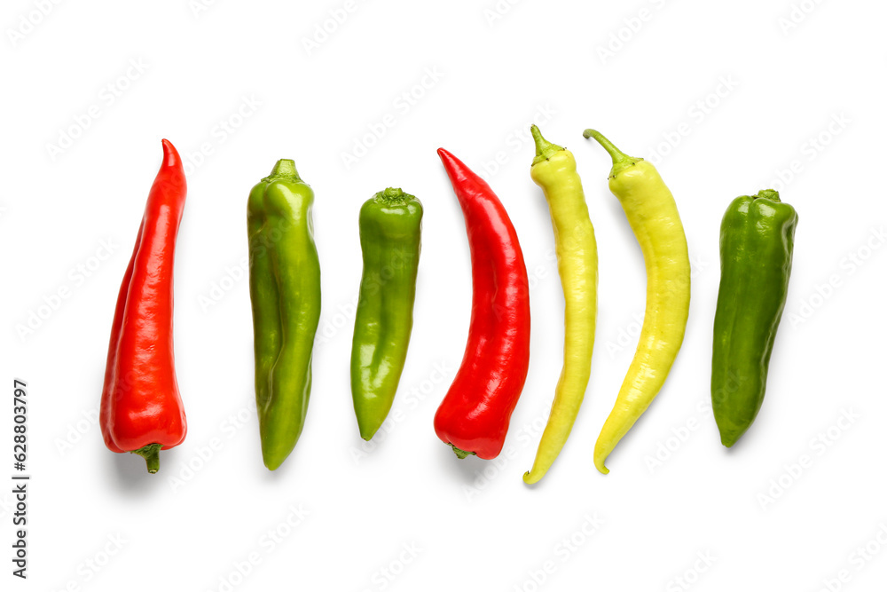 Different chili pepper on white background