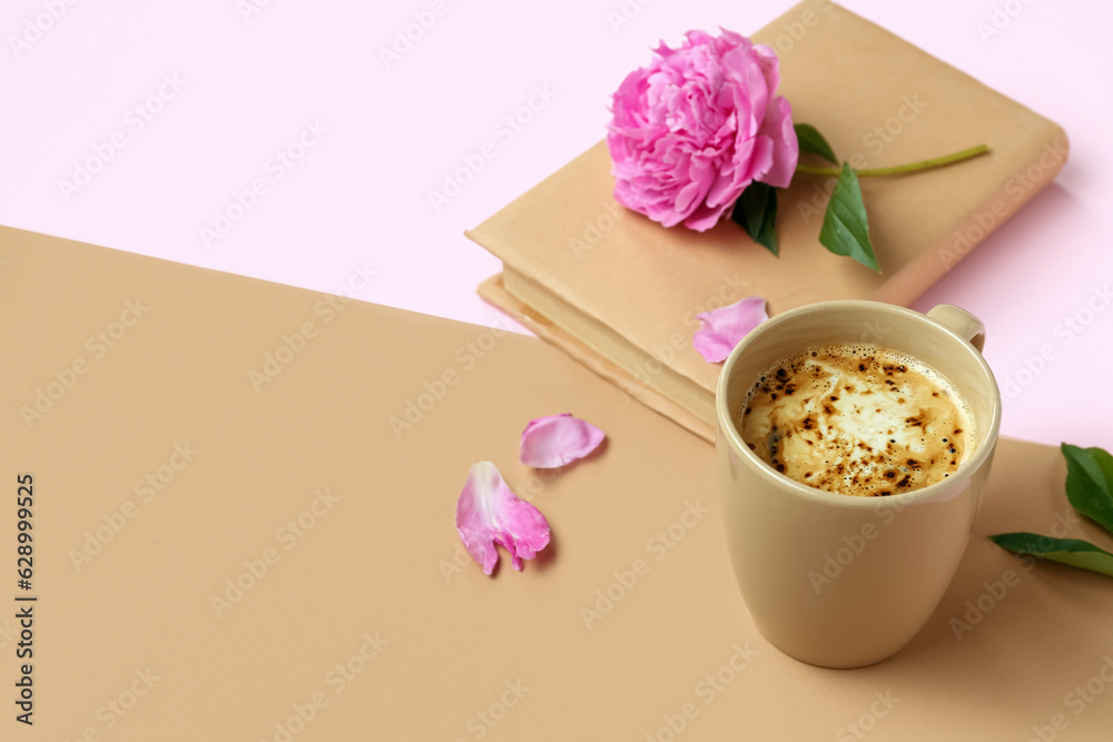 Composition with cup of coffee, book and peony flower on color background