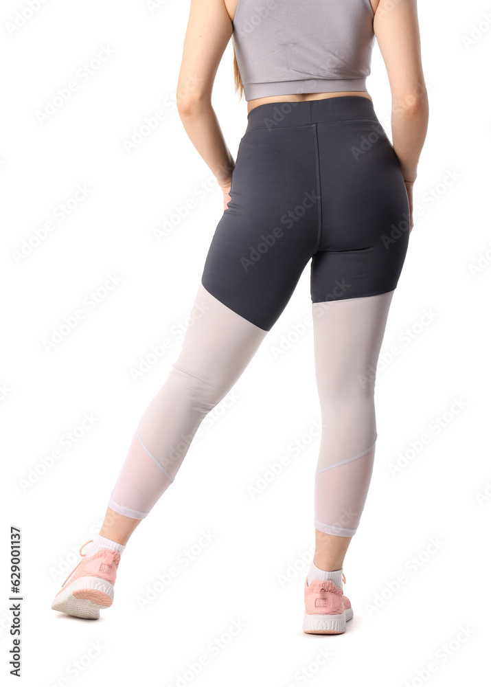 Sporty young woman in leggings on  white background, back view