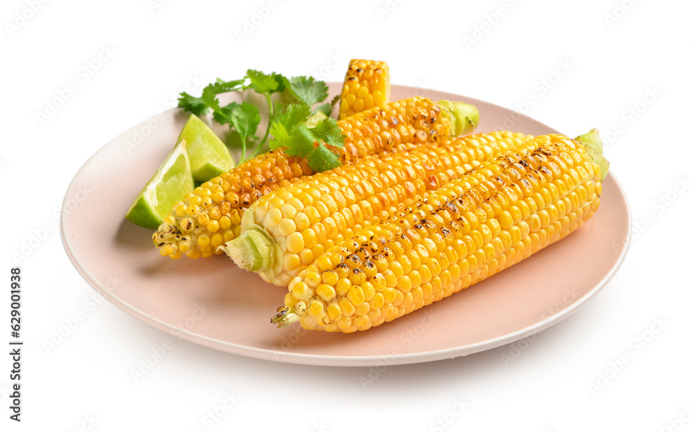 Plate with tasty grilled corn cobs and lime on white background