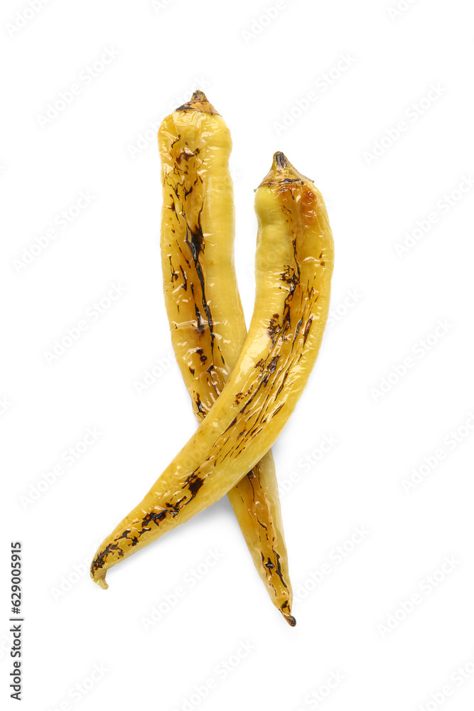 Grilled chili peppers on white background