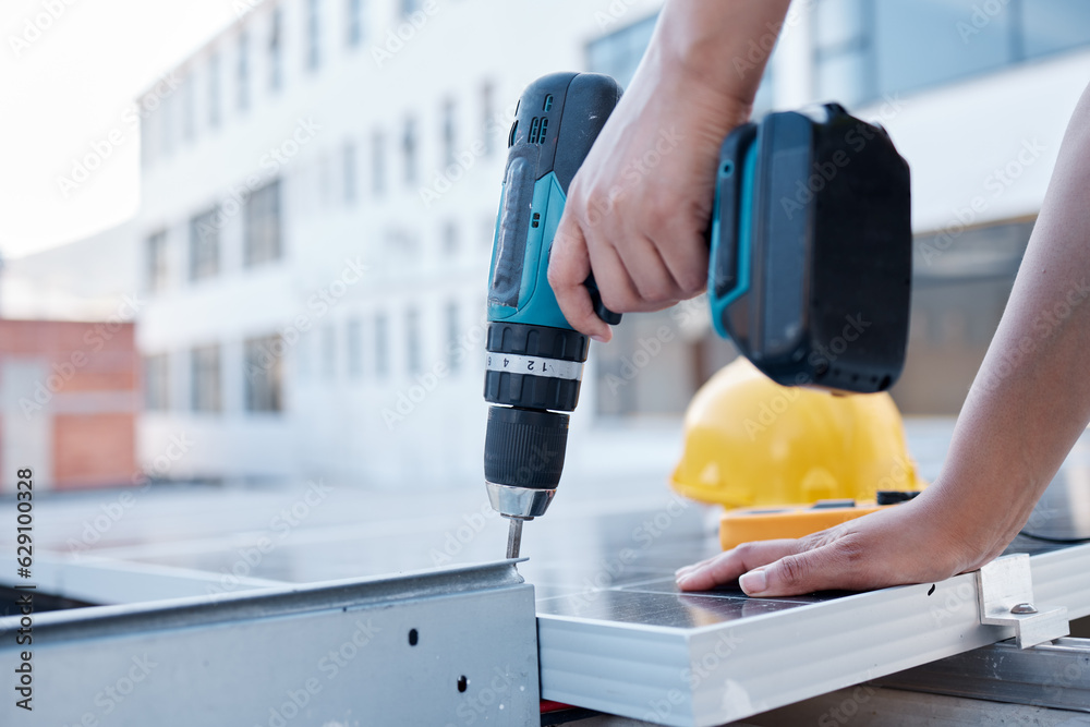 Solar panels, hands and electrician with power drill for engineering, grid and building maintenance 