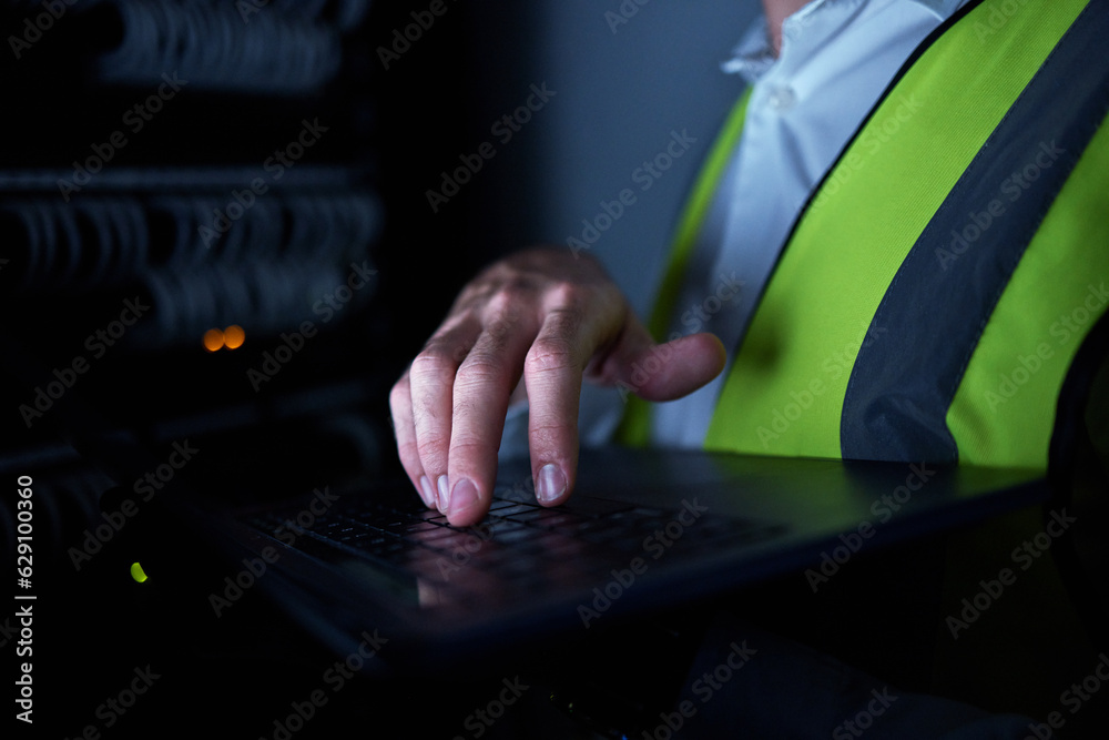 Engineering, night and hands of person on laptop for maintenance, repair and inspection in server ro