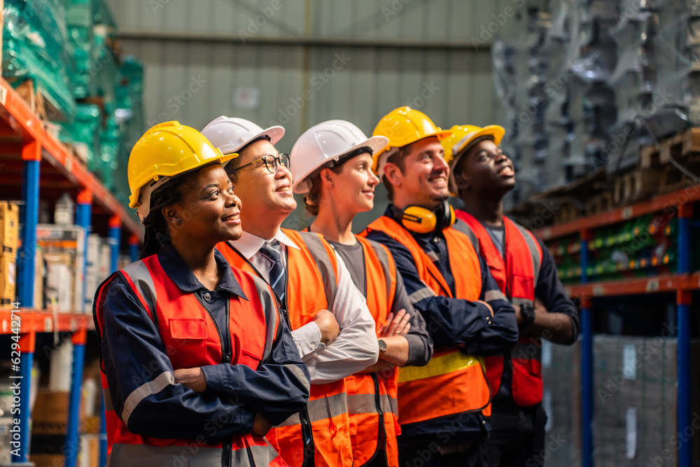 Portrait group of diverse industry worker working in factory warehouse. 