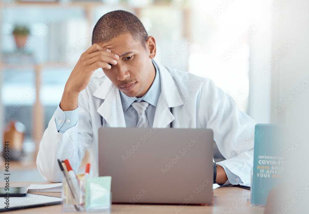 Headache, doctor and man at laptop in medical office with burnout challenge, clinic problem and stre