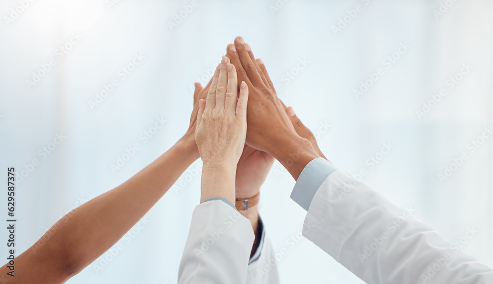 Closeup, doctors and nurses in hospital high five hands for team building success, motivation or hea