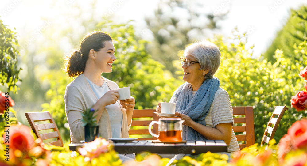 women drinking tea in the garden