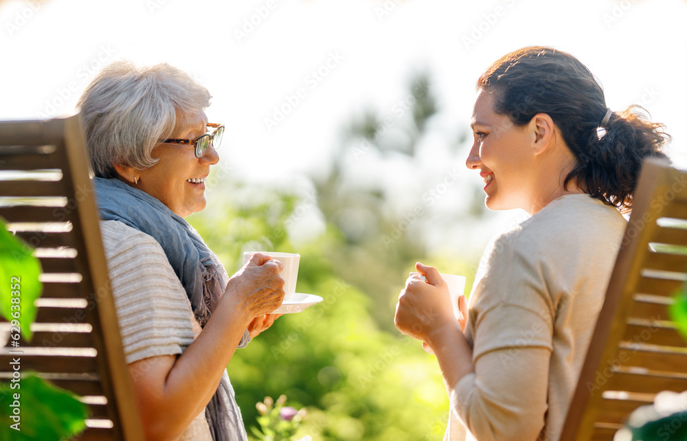 women drinking tea in the garden