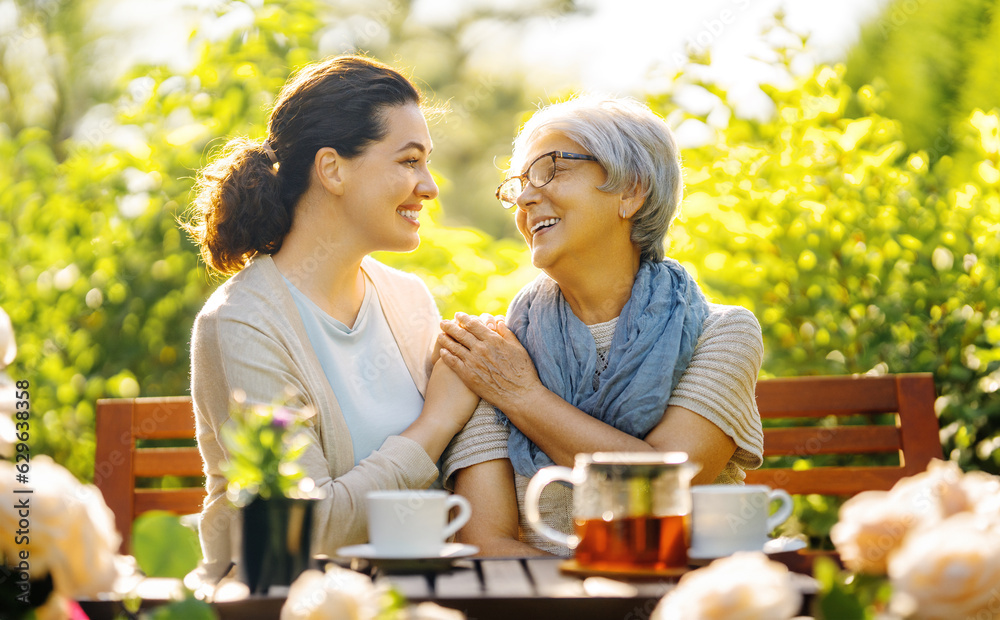 women drinking tea in the garden