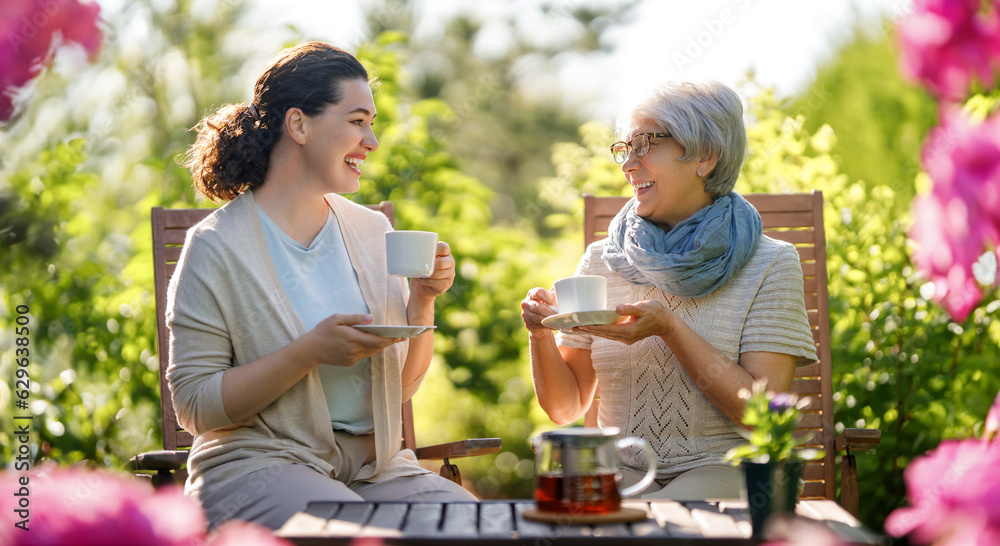 women drinking tea in the garden