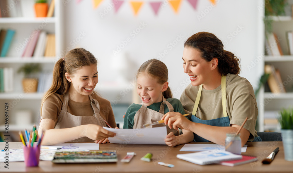 kids and teacher at the art class