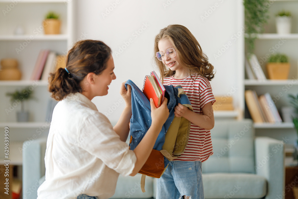 Happy family preparing for school