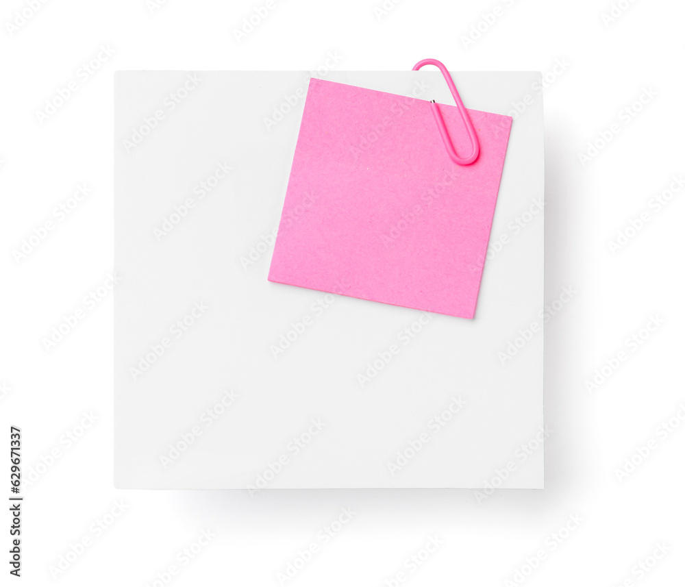 Colorful sticky notes with paper clip on white background