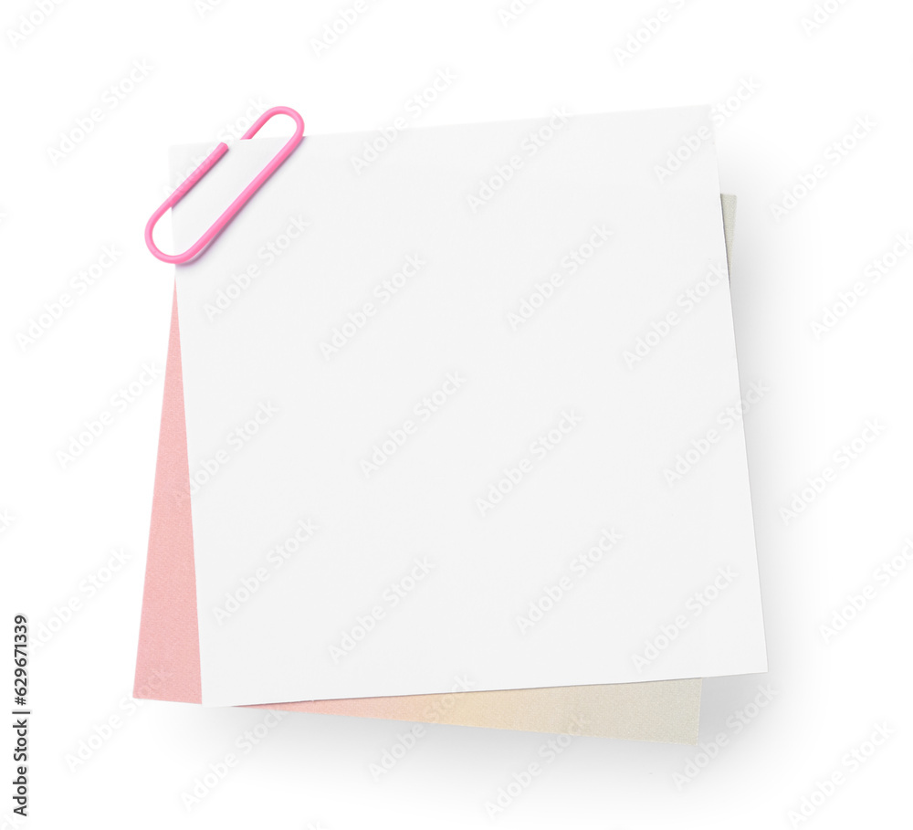 Sticky notes with paper clip on white background