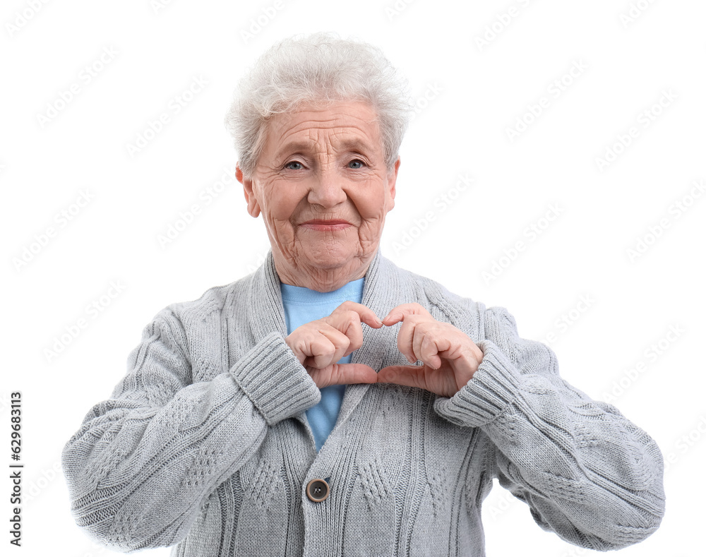 Senior woman making heart with her hands on white background