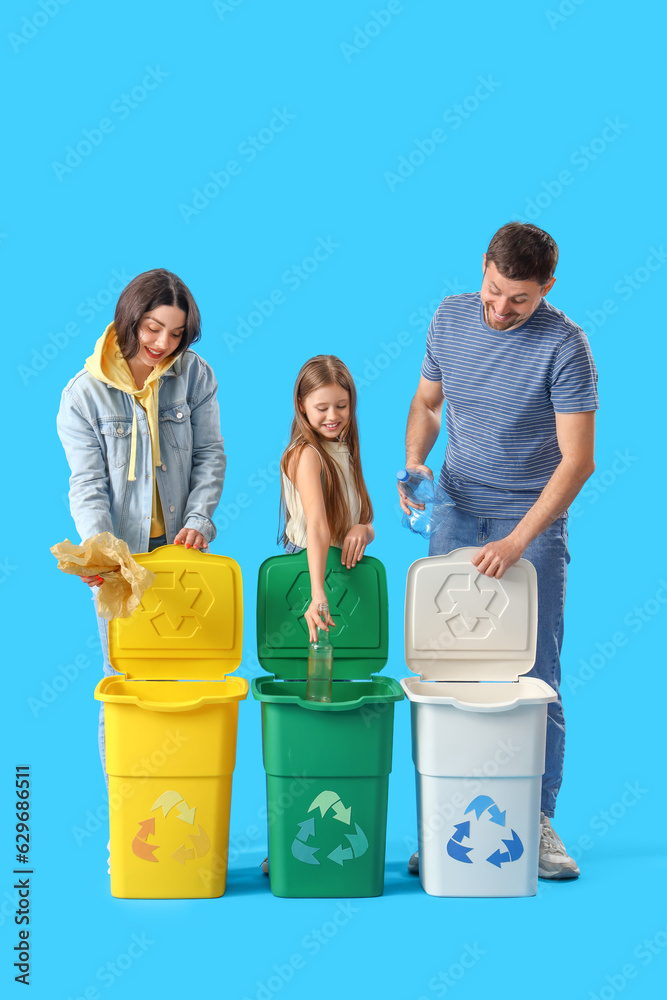 Family sorting garbage in recycle bins on blue background