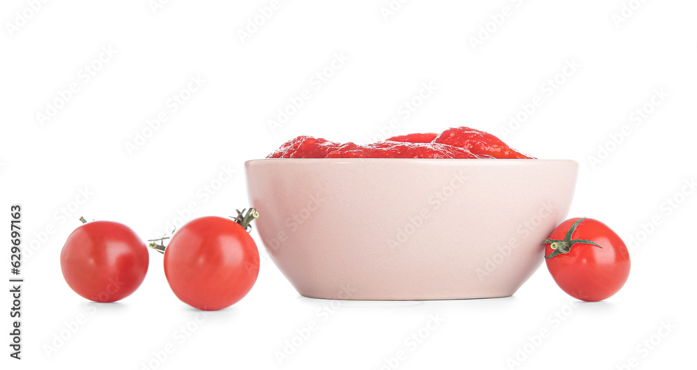 Bowl with canned tomatoes on white background