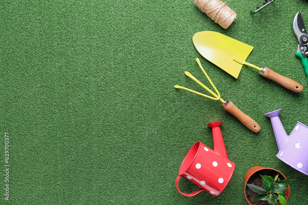 Composition with different gardening tools on color background