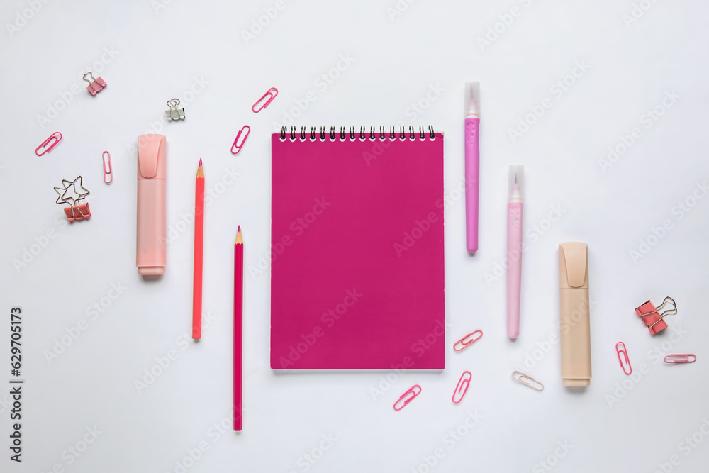 Composition with colorful stationery isolated on white background