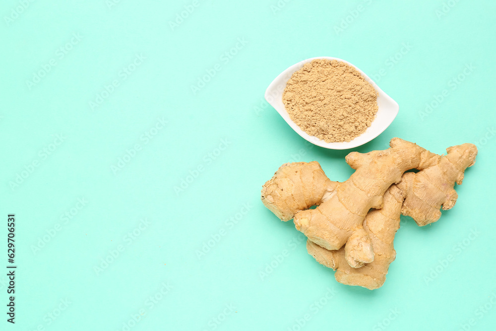 Fresh ginger root and bowl with dried powder on turquoise background