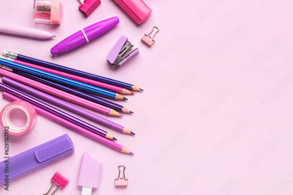 Composition with different stationery on lilac background