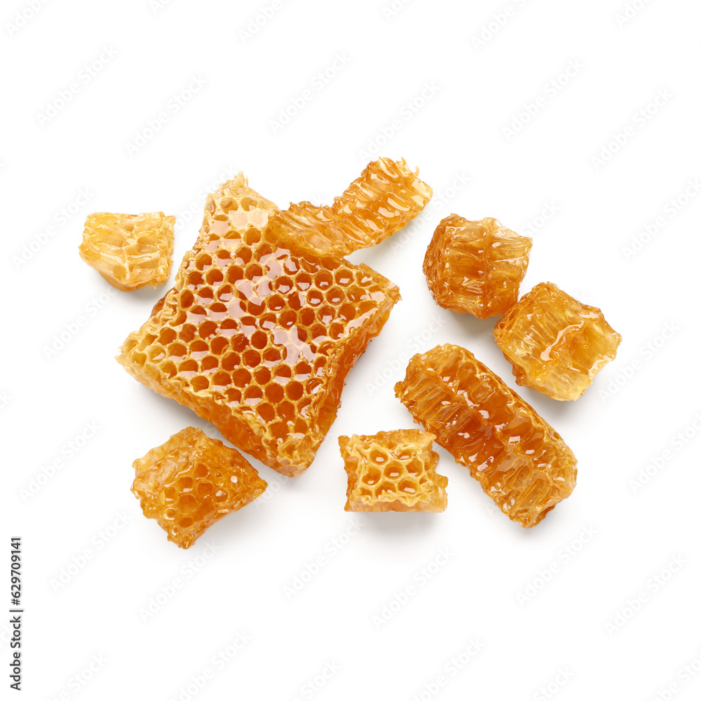 Sweet honeycombs on white background