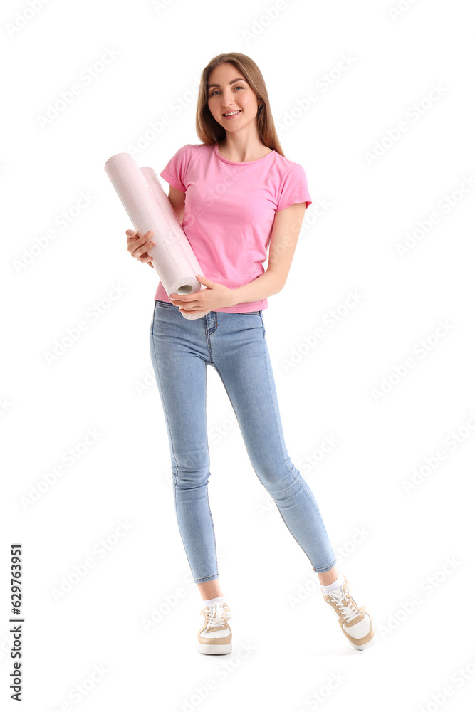 Young woman with wallpaper rolls on white background