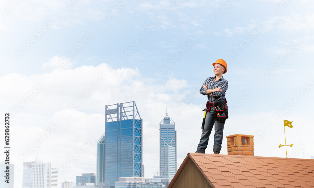 Attractive female worker in hardhat