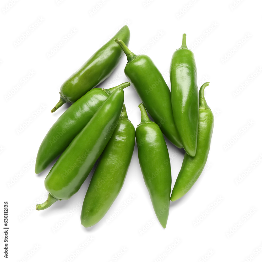 Green chili peppers on white background