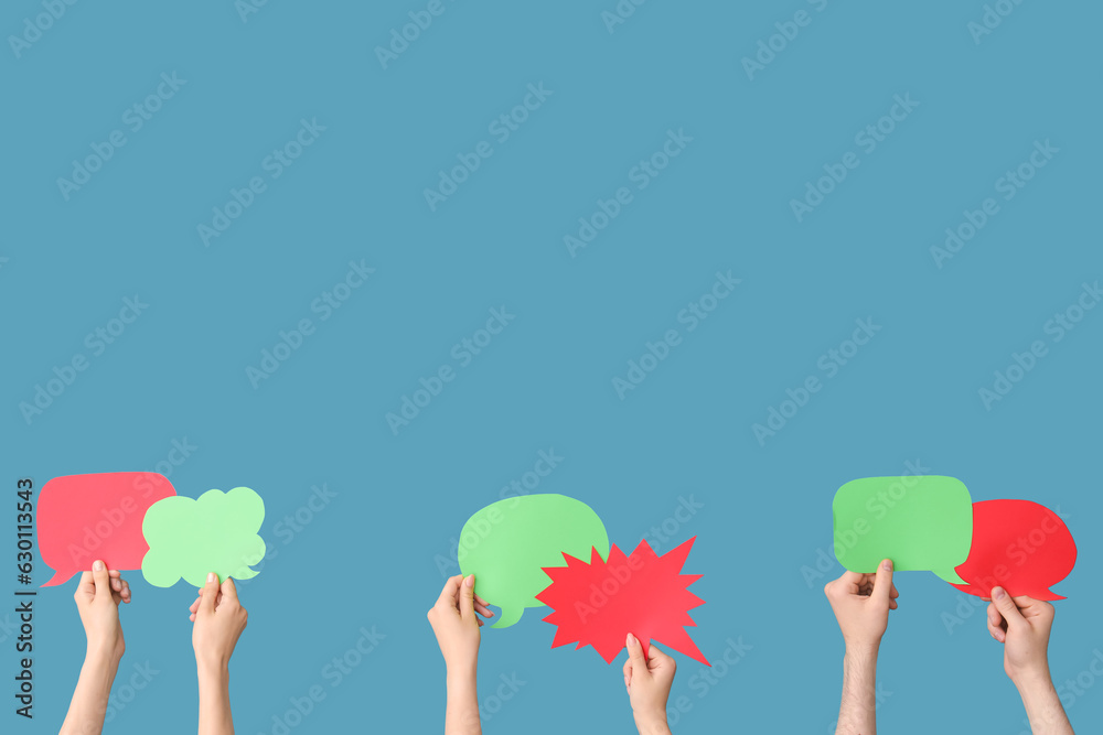 Different hands with speech bubbles on blue background