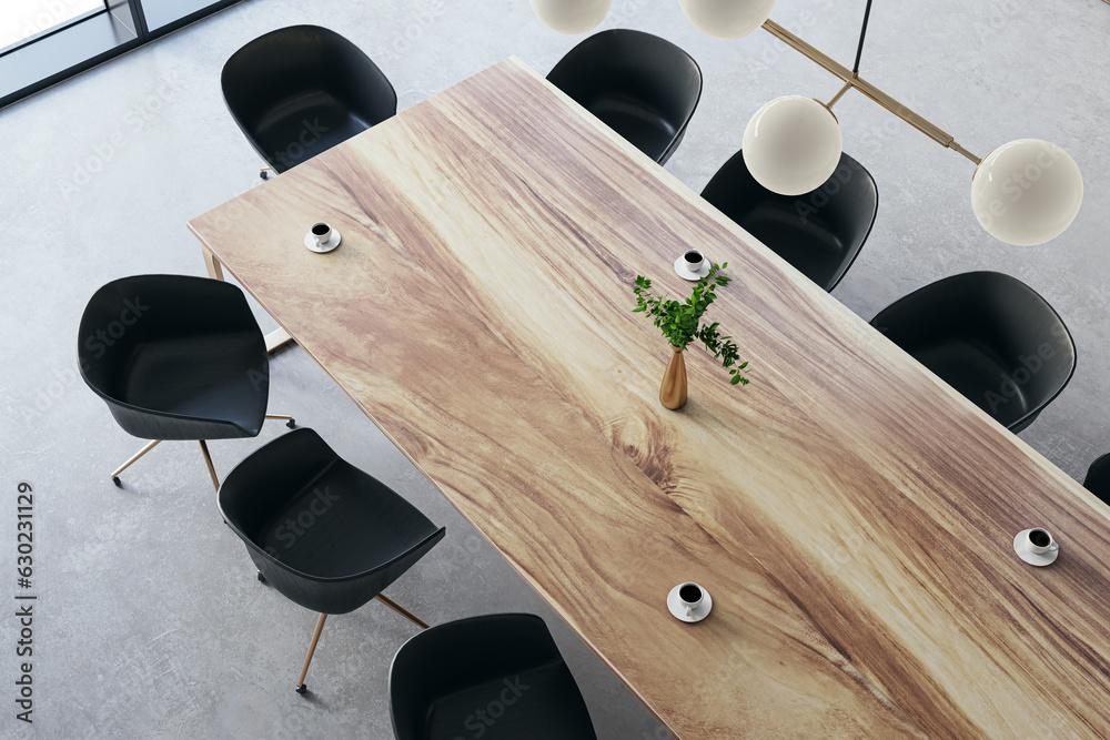 Top view of modern luxury meeting room interior with wooden office desk and chairs and concrete floo