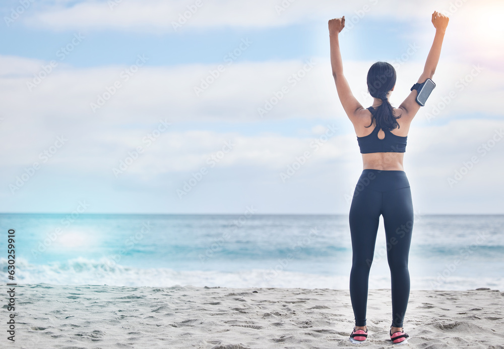 Fitness, celebration and woman with arms up at beach, mockup and winning achievement in nature. Ocea