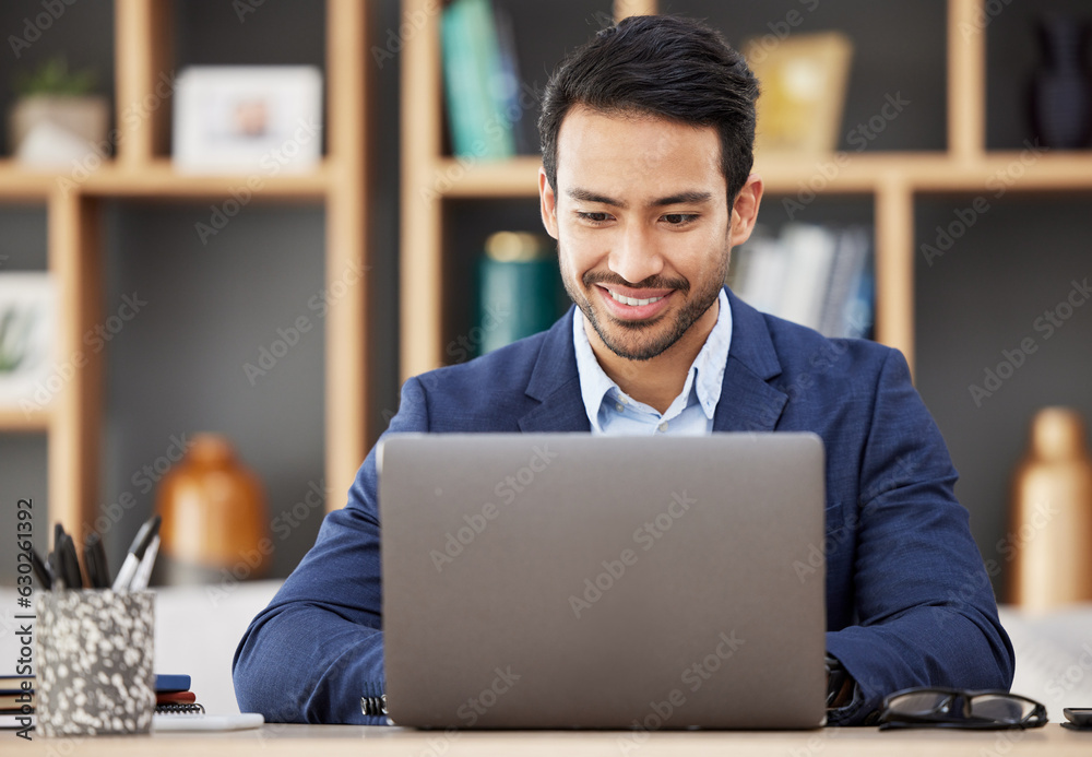 Man in office with laptop, smile and typing email, proposal or writing online report networking at s