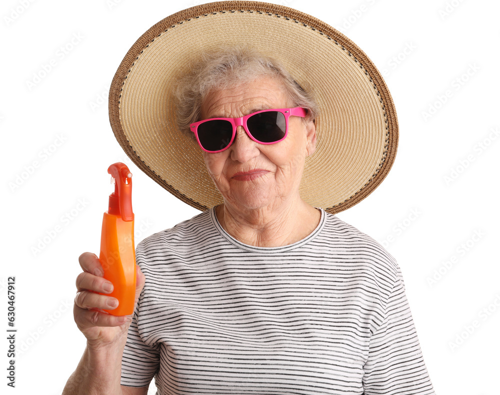 Senior woman with sunscreen cream on white background