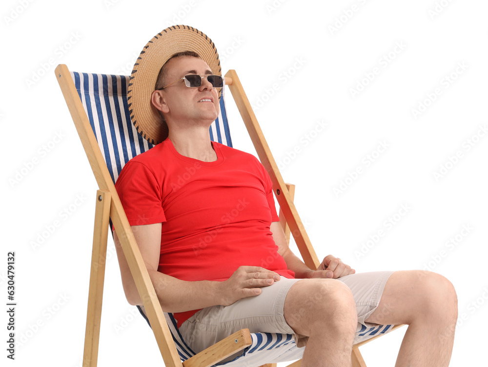 Mature man relaxing in deck chair on white background