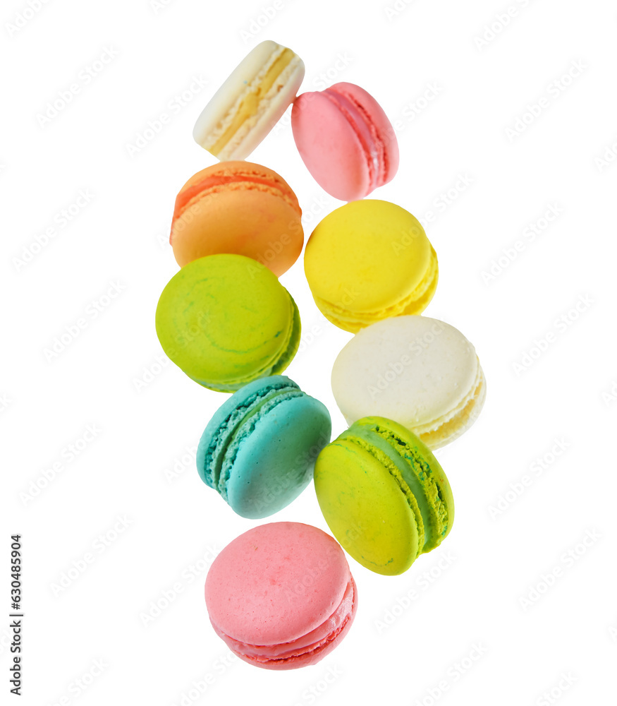 Flying sweet macaroons on white background