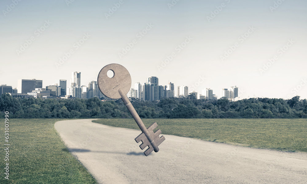 Conceptual background image of concrete key sign on asphalt road