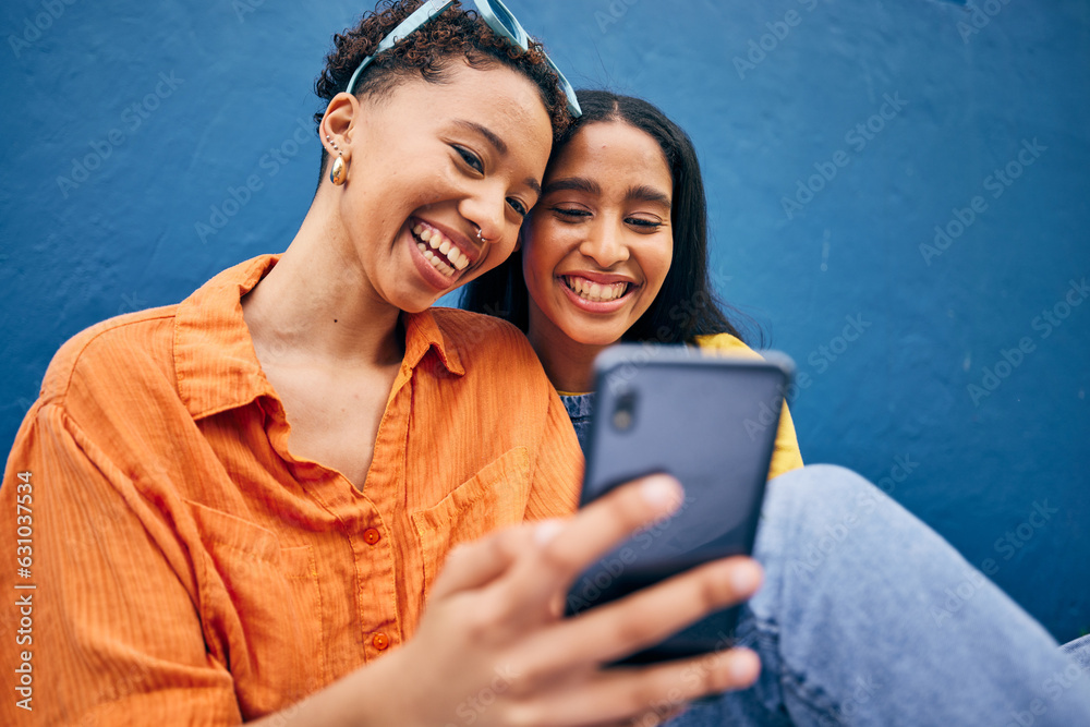 Phone, happy and women in city on blue background for social media, online post and browse internet.