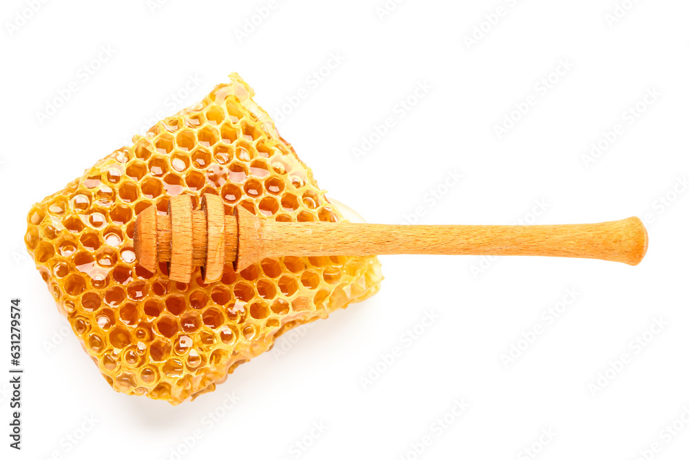 Sweet honeycomb and dipper on white background