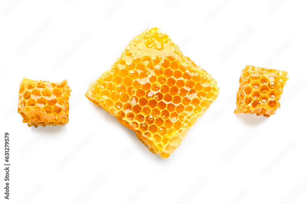 Sweet honeycombs on white background