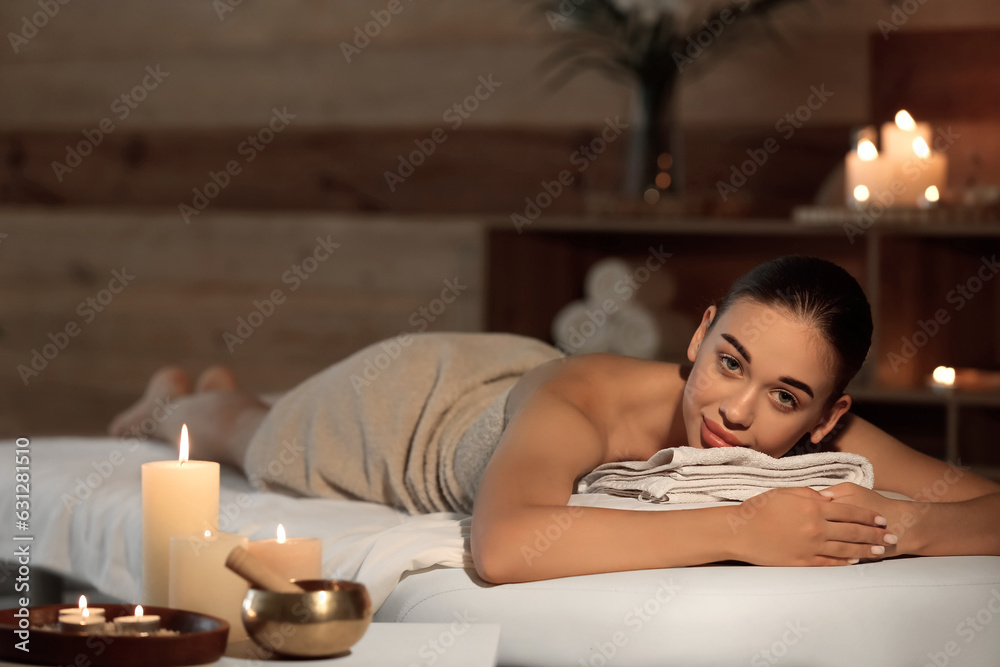 Pretty young woman in spa salon