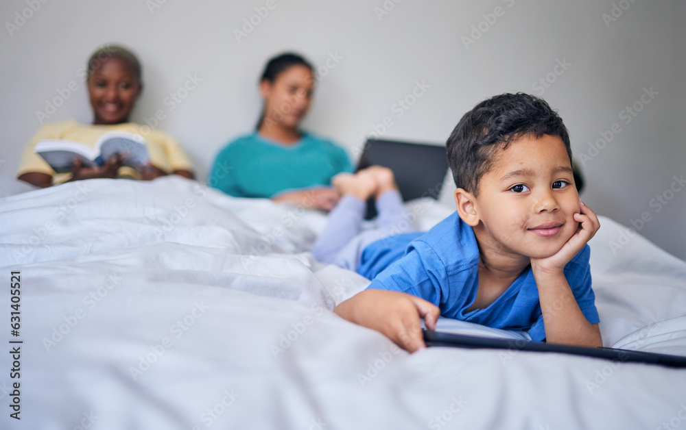 Kid, tablet and happy portrait in bed at family home in the morning with lgbt parents feeling relax.