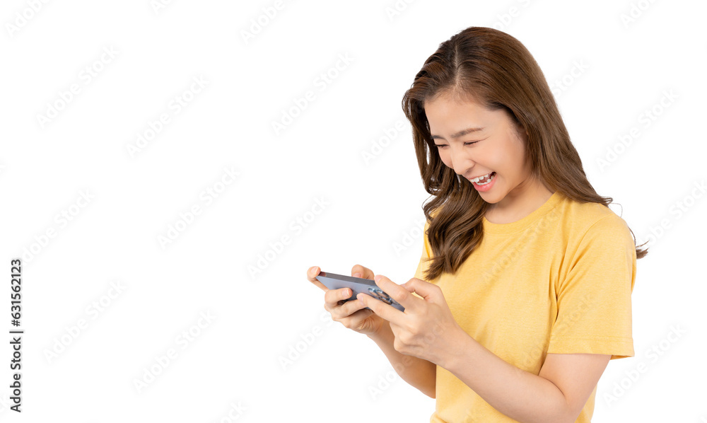 Excited Young Asian woman playing online game on smartphone isolated on white background copy space 