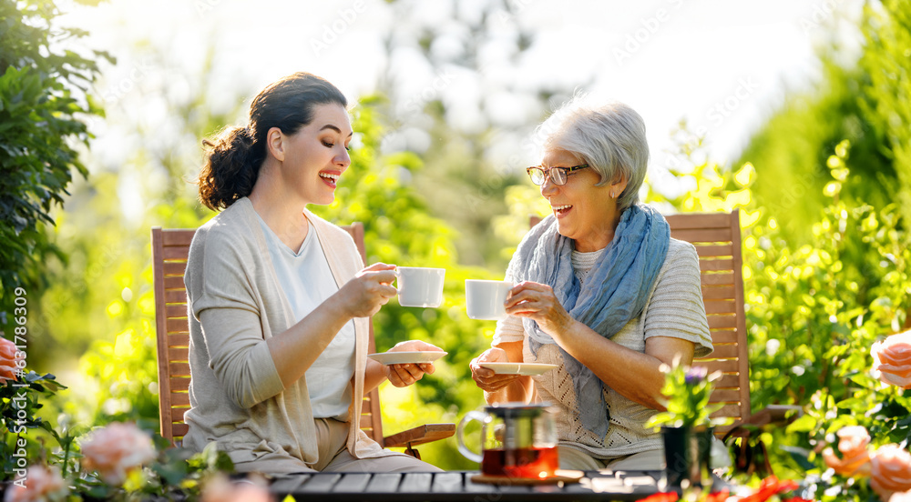 women drinking tea in the garden