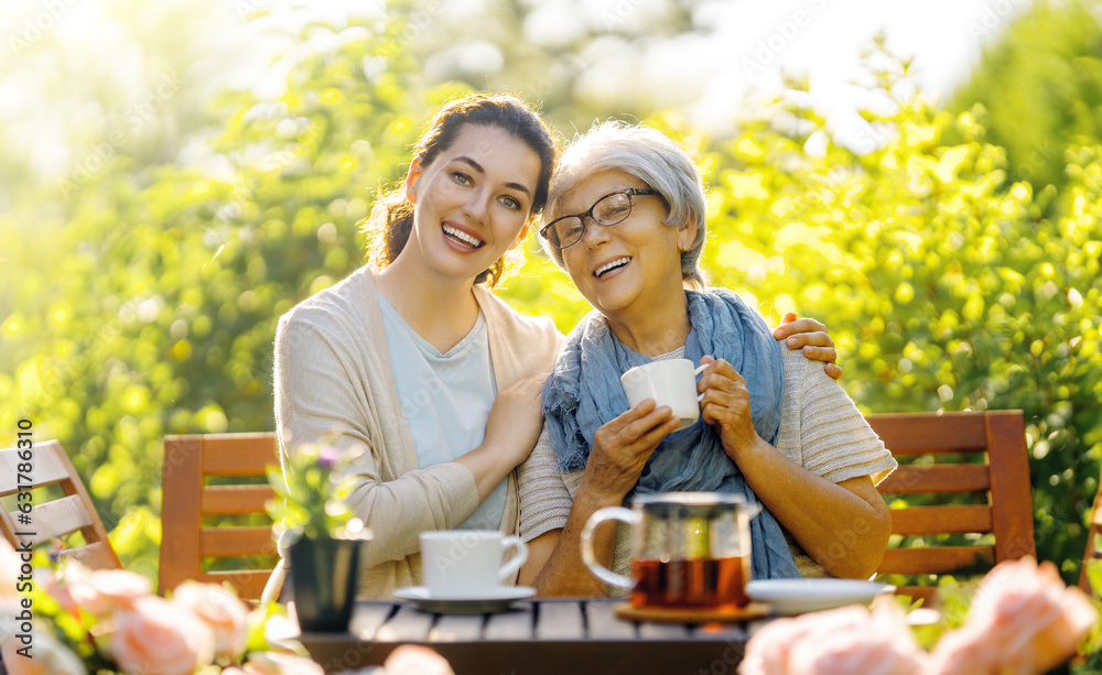 women drinking tea in the garden