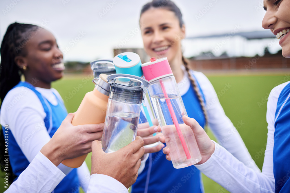 Sports women group, grass and bottle in circle for toast, celebration and diversity with team buildi